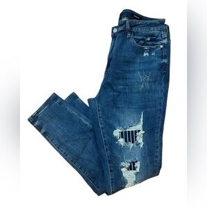 Judy Blue Woman’s Distressed & Patched Skinny Jeans